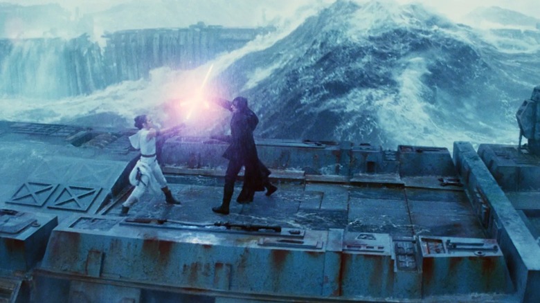 Rey and Kylo Ren fighting on the Death Star ruins in Star Wars: The Rise of Skywalker (2019)