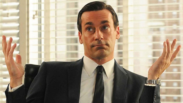 Don shrugging in his office on Mad Men