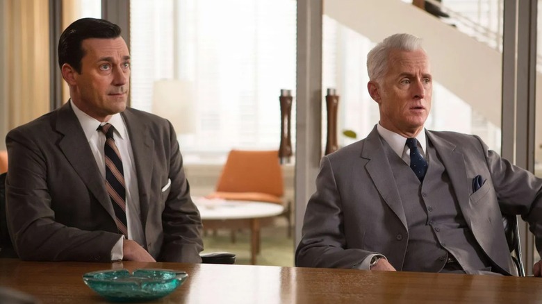 Don and Roger sitting in the conference room looking skeptical on Mad Men