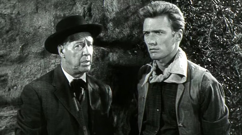 Keith Williams listening to bad news in Ambush at Cimarron Pass (1958)