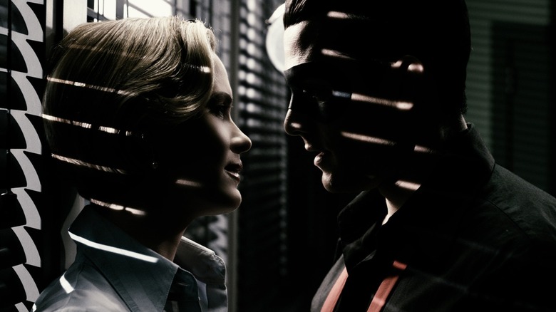 Dr. Ellen Dolan and The Spirit sharing a tender moment in The Spirit (2008)