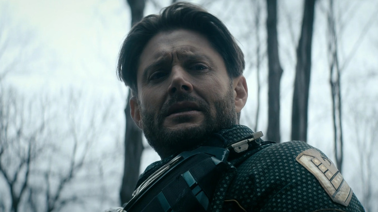 Soldier Boy standing in the woods looking down at something in "The Boys" (2019-2026)