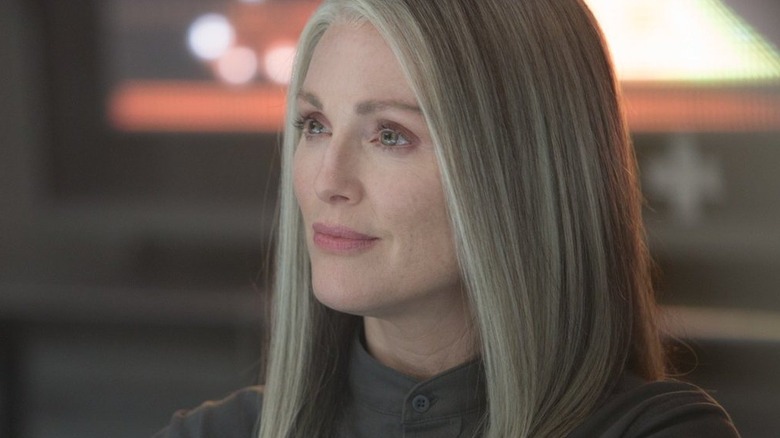 President Alma Coin smiling in "The Hunger Games: Mockingjay - Part 1"