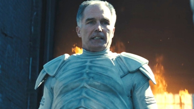 Romulus Thread next to some flames in "The Hunger Games: Catching Fire"