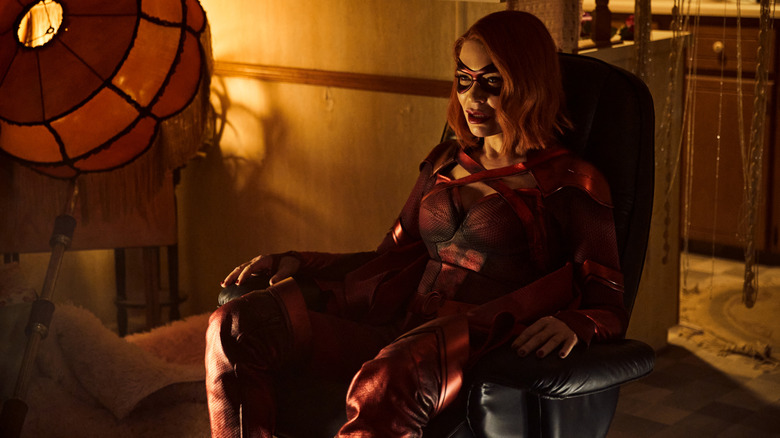 Crimson Countess sitting in a chair in "The Boys"