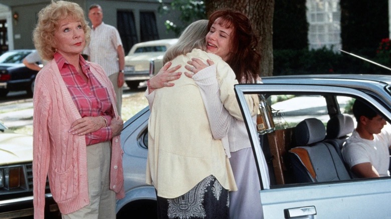Aurora rolling her eyes at a tender reunion in The Evening Star (1996)