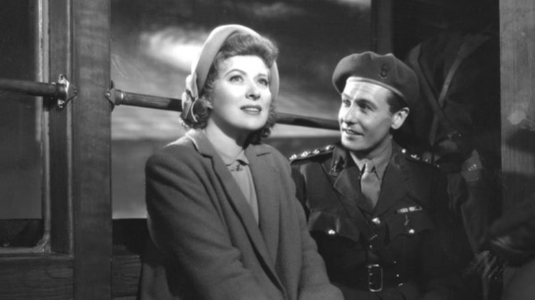 A wistful moment on a train in The Miniver Story (1950)