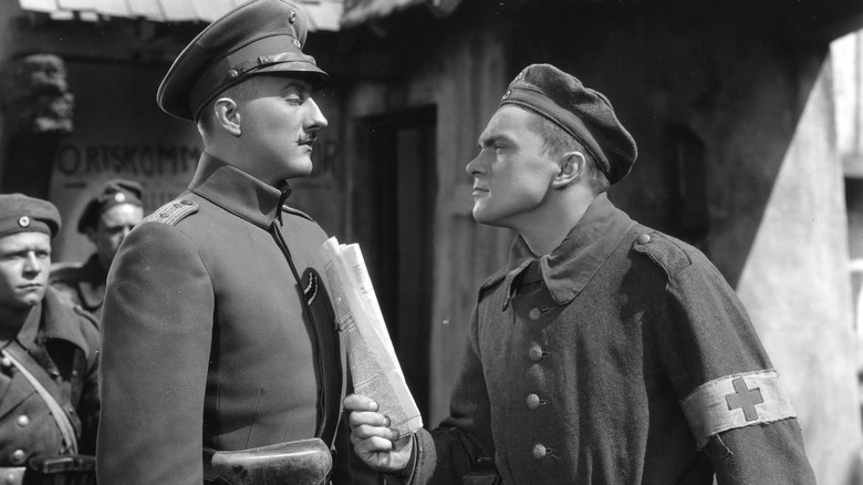 A confrontation between a medical officer and his superior in The Road Back (1937)
