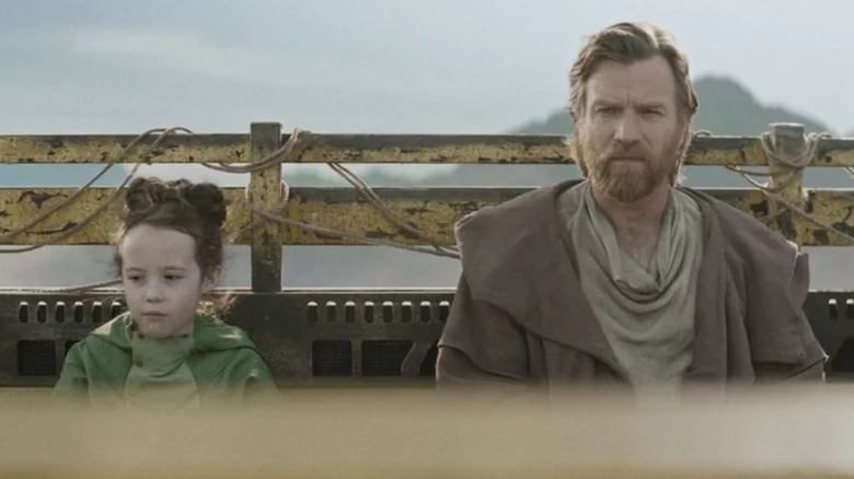 Princess Leia and Obi-Wan Kenobi sit in the back of a vehicle in Obi-Wan Kenobi (2022)