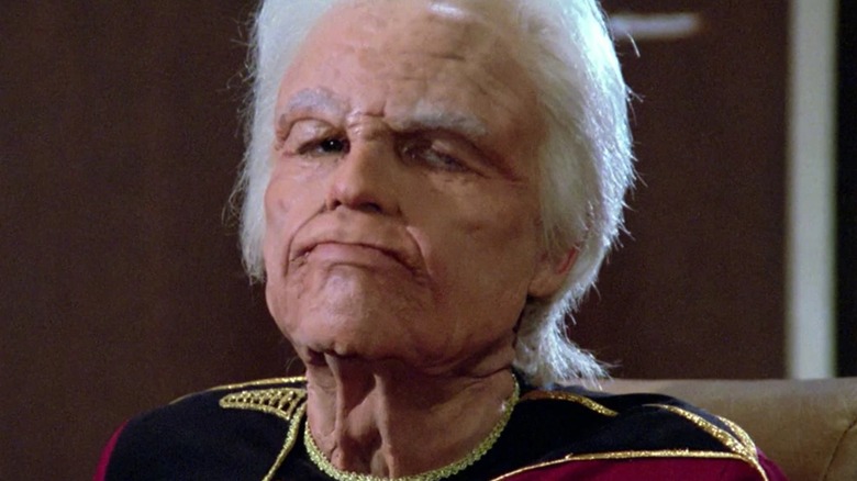 An elderly Adm. Mark Jameson sitting in a chair on the USS Enterprise in "Star Trek: The Next Generation" (1987-1994)