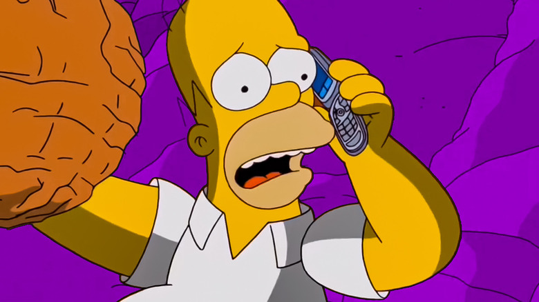 Homer looking concerned while talking on cellphone in front of purple background