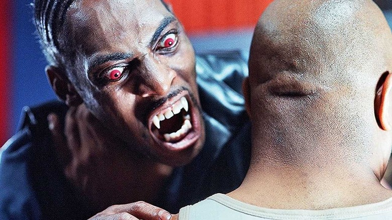 A vampirized 187 attempts to bite Humvee's neck