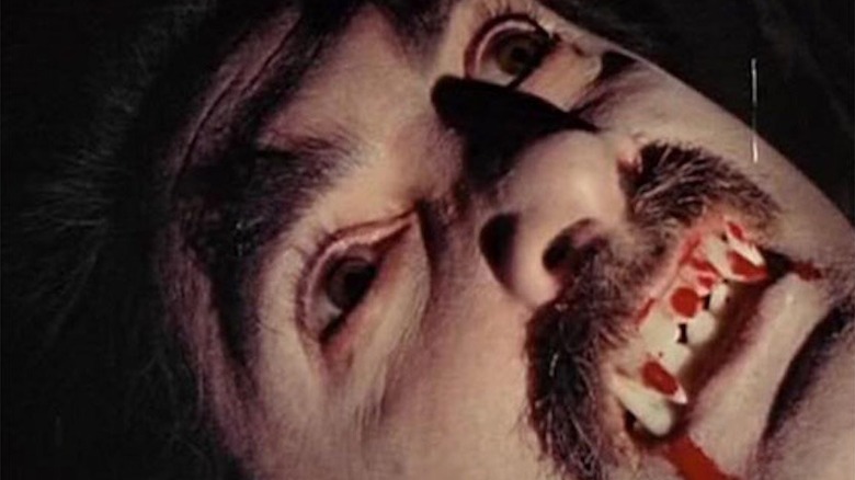 Father Daken bares his bloody fangs
