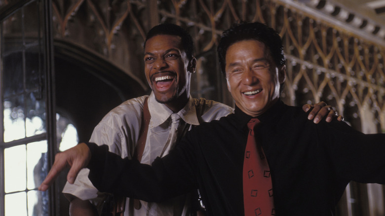 Chris Tucker puts his arm around Jackie Chan