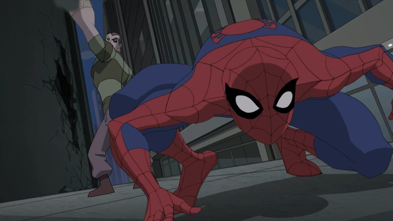 Sandman chases Spider-Man in city