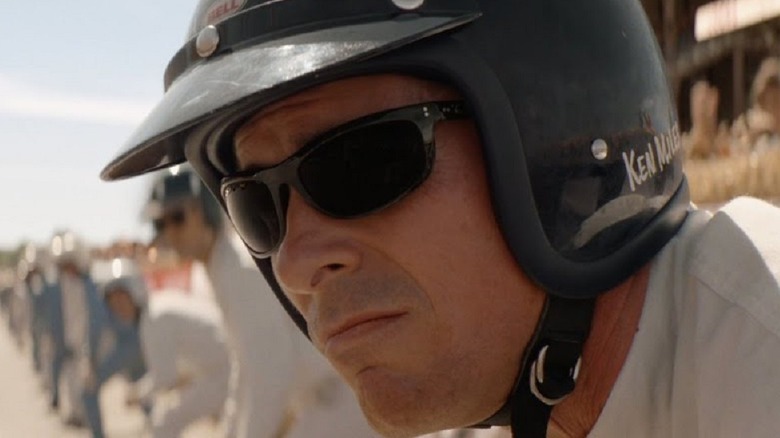 Christian Bale with helmet in Ford v Ferrari