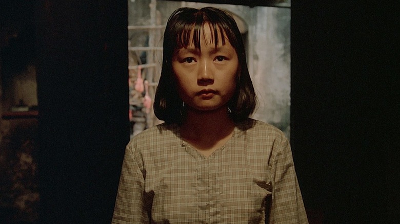 Cam Nuong with an inquiring expression on her face