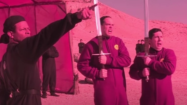 Vel-Dan pointing at enemy