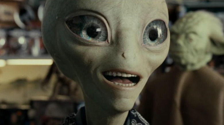 Alien Paul smiling widely