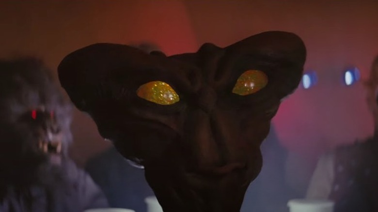 Triangular Star Wars alien staring