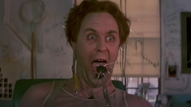 Dr. Emilio Lizardo being electrocuted