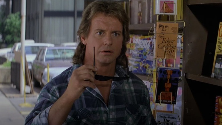 Roddy Piper taking sunglasses off