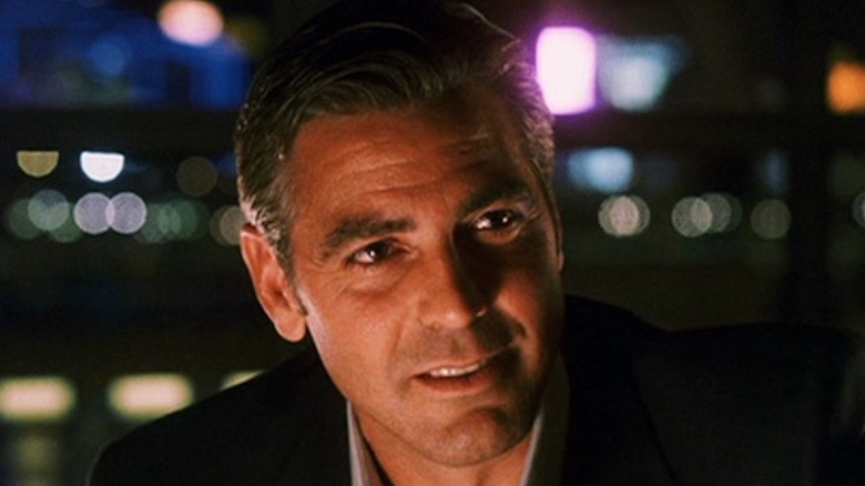 Danny Ocean smiling at night