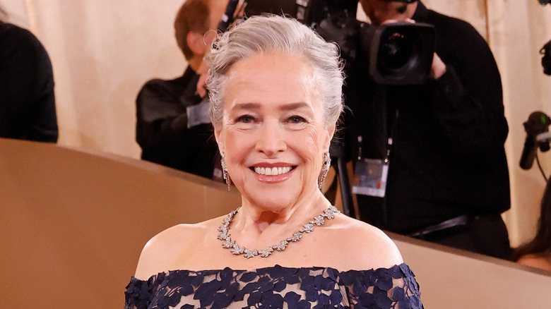 Kathy Bates wearing blue evening gown