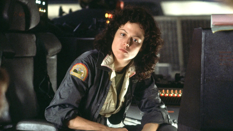 Ripley on the ship looking concerned in Alien