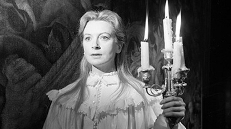 Deborah Kerr holding candles