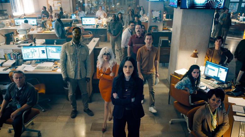 Lois Lane and the Daily Planet crew watching television in Superman (2025)