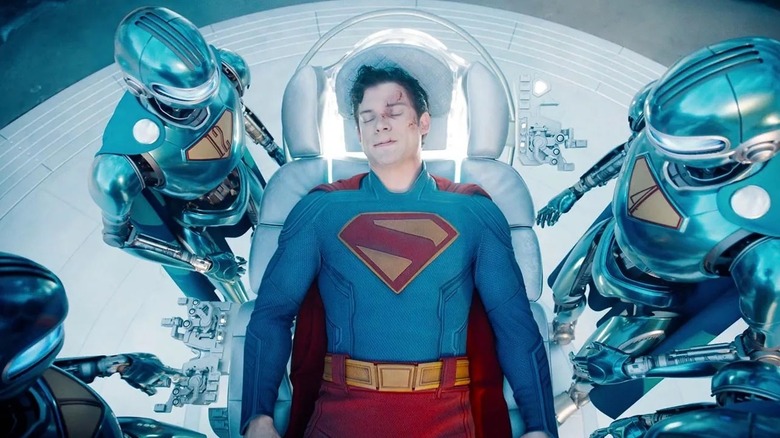 Superman being repaired by his robots in Superman (2025)