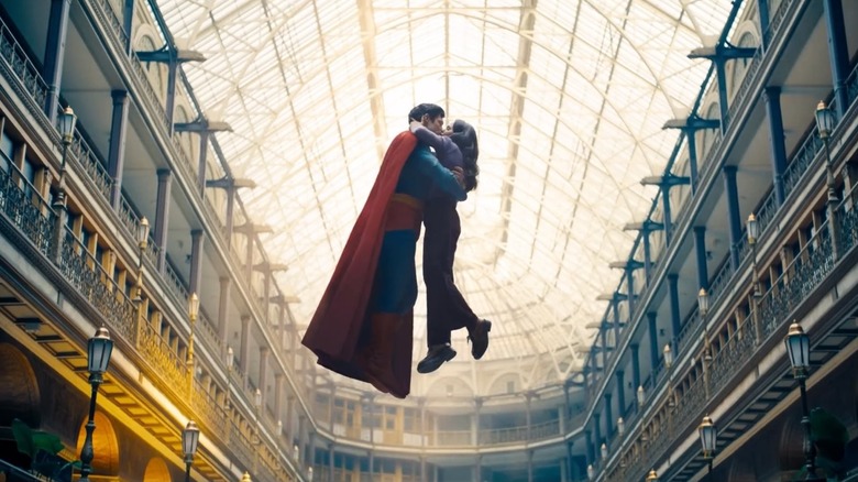 Superman and Lois Lane smooching in the air