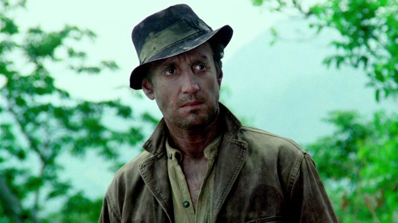 Jackie Scanlan wearing a hat outside in 'Sorcerer' (1977)