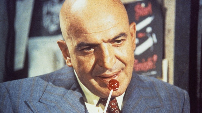 Kojak licks a lollipop in "Kojak"
