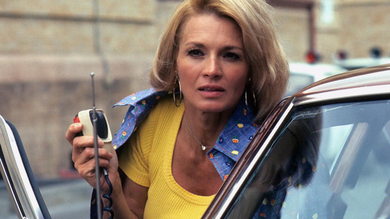 Sgt. Anderson talks on a police radio in "Police Woman"