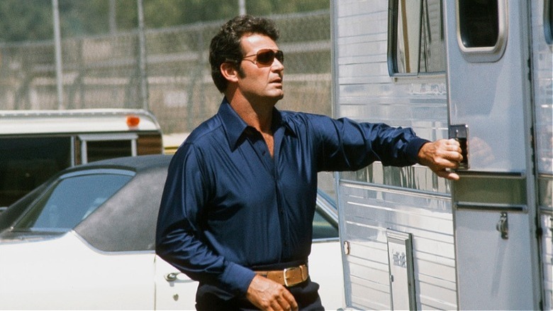 Jim Rockford opening a trailer door in "The Rockford Files"