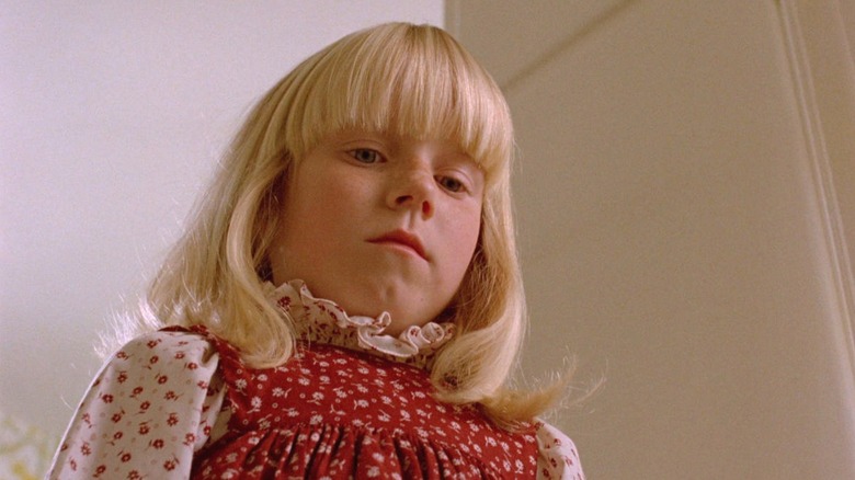 Candice frowning in "The Brood."