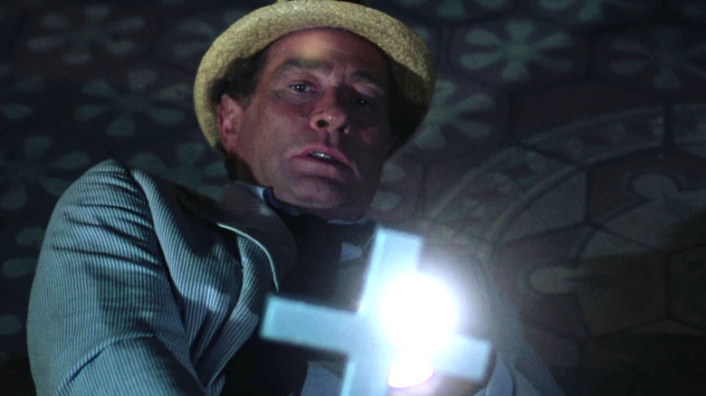 Kolchak holds a cross