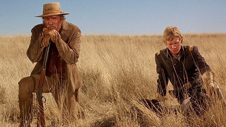 McIntosh and Debuin sit and contemplate in a wheat field in "Ulzana's Raid" (1972)