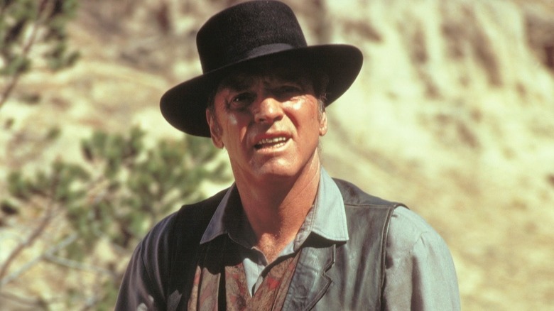Maddox standing outdoors in "Lawman"