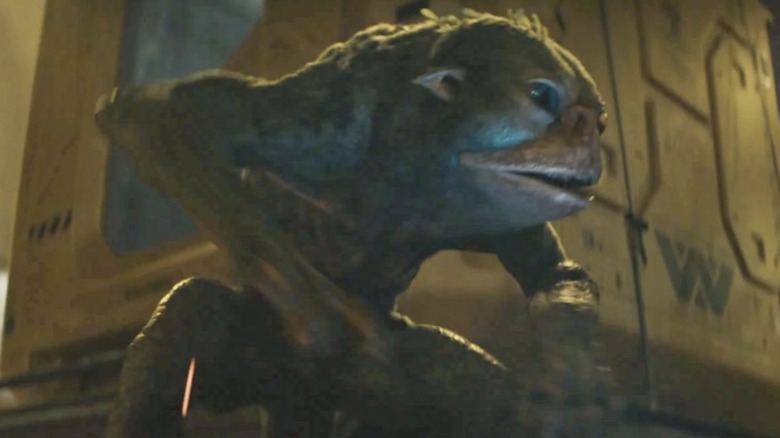 Bud after winning a skirmish in "Predator: Badlands" (2025)