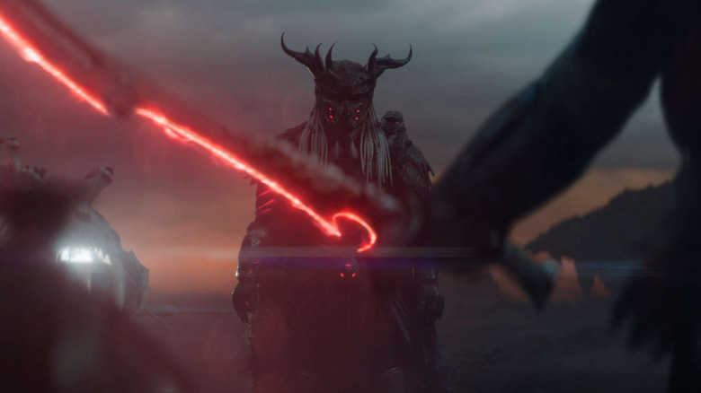 Kwei preparing to fight his father in "Predator: Badlands" (2025)