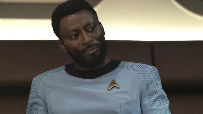 Joseph M'Benga tilting head on Star Trek Strange New Worlds Under the Cloak of War (2023)