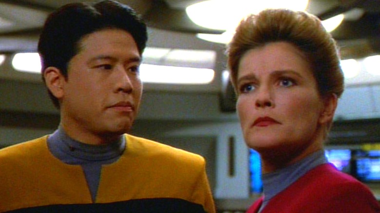 Harry Kim standing with Janeway