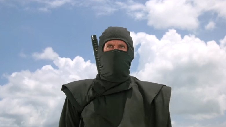 Joe Armstrong standing outside in "American Ninja"