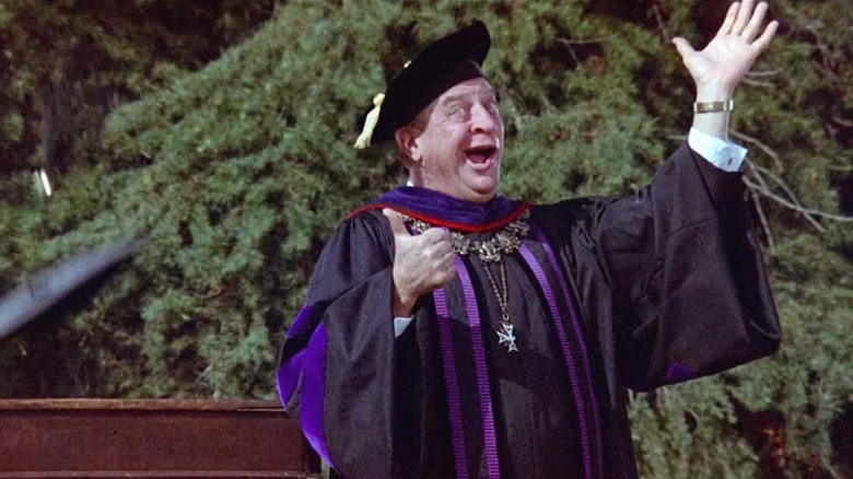 Thornton Melon wearing a graduation cap and gown in Back to School