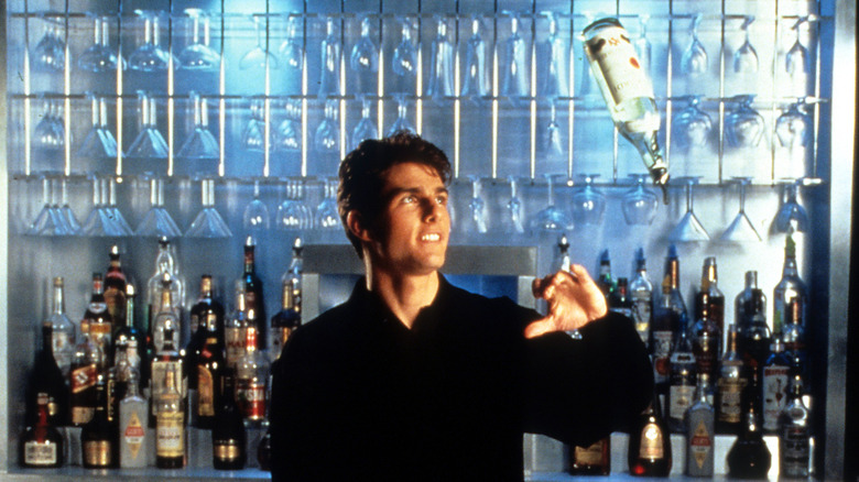 Brian Flanagan tossing a vodka bottle in Cocktail