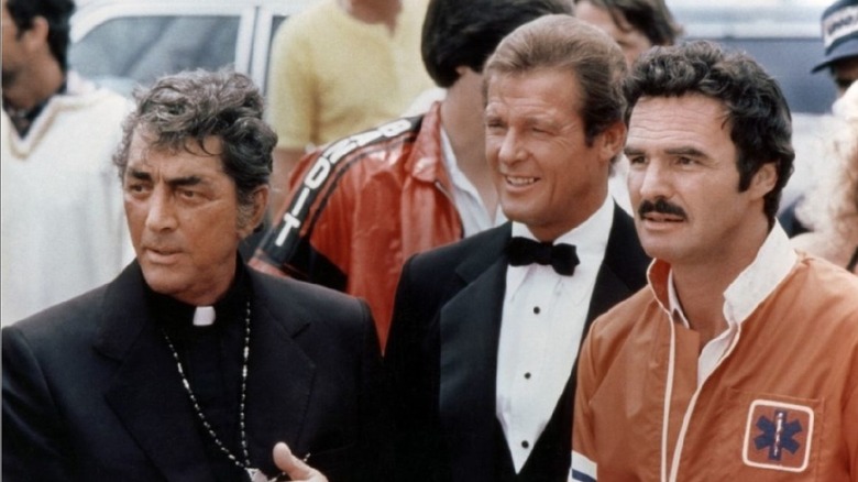 Jamie Blake, Seymour Goldfarb, and J. J. McClure watching a race in The Cannonball Run