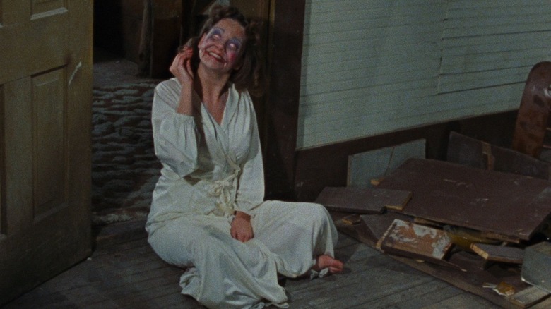 A possessed Linda giggles in "The Evil Dead" (1981)